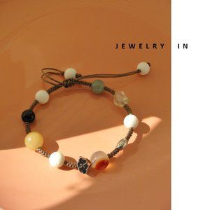 Hand braided rope sterling silver & variety of gems bracelet